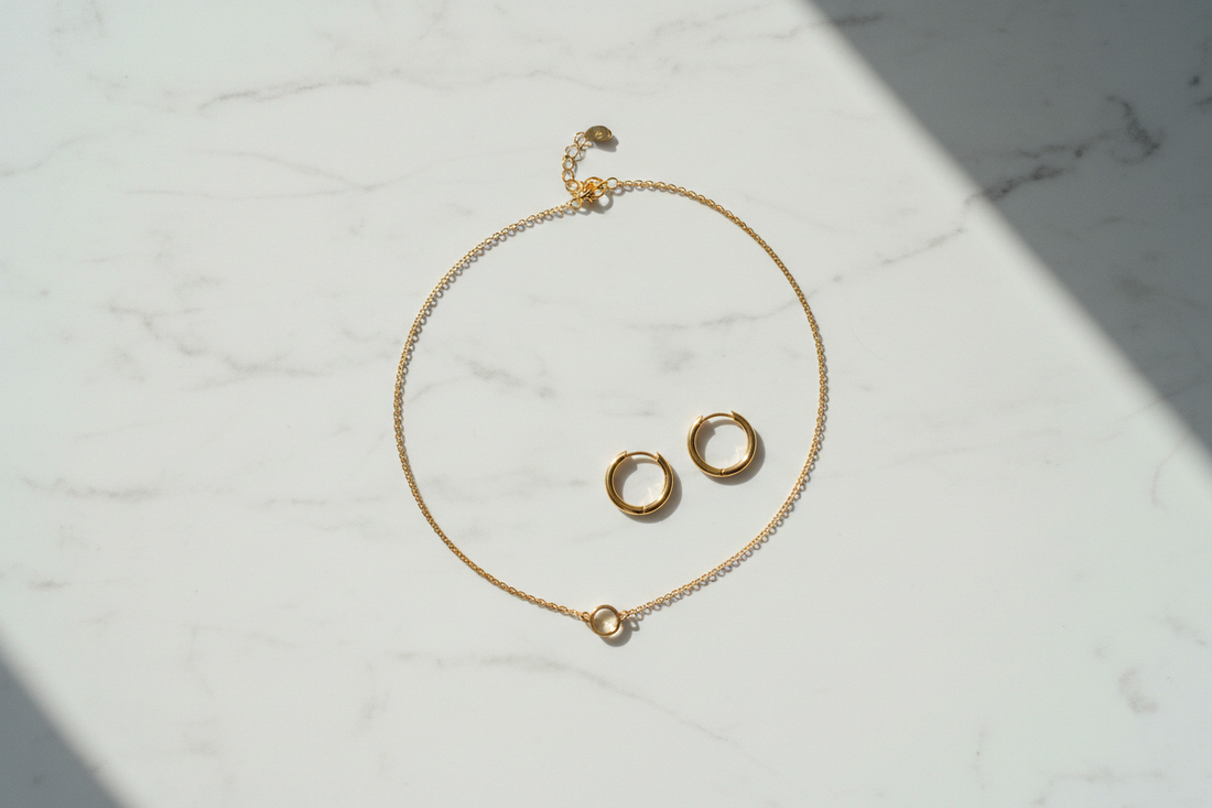 Minimalist thin chain necklace and small hoop earrings