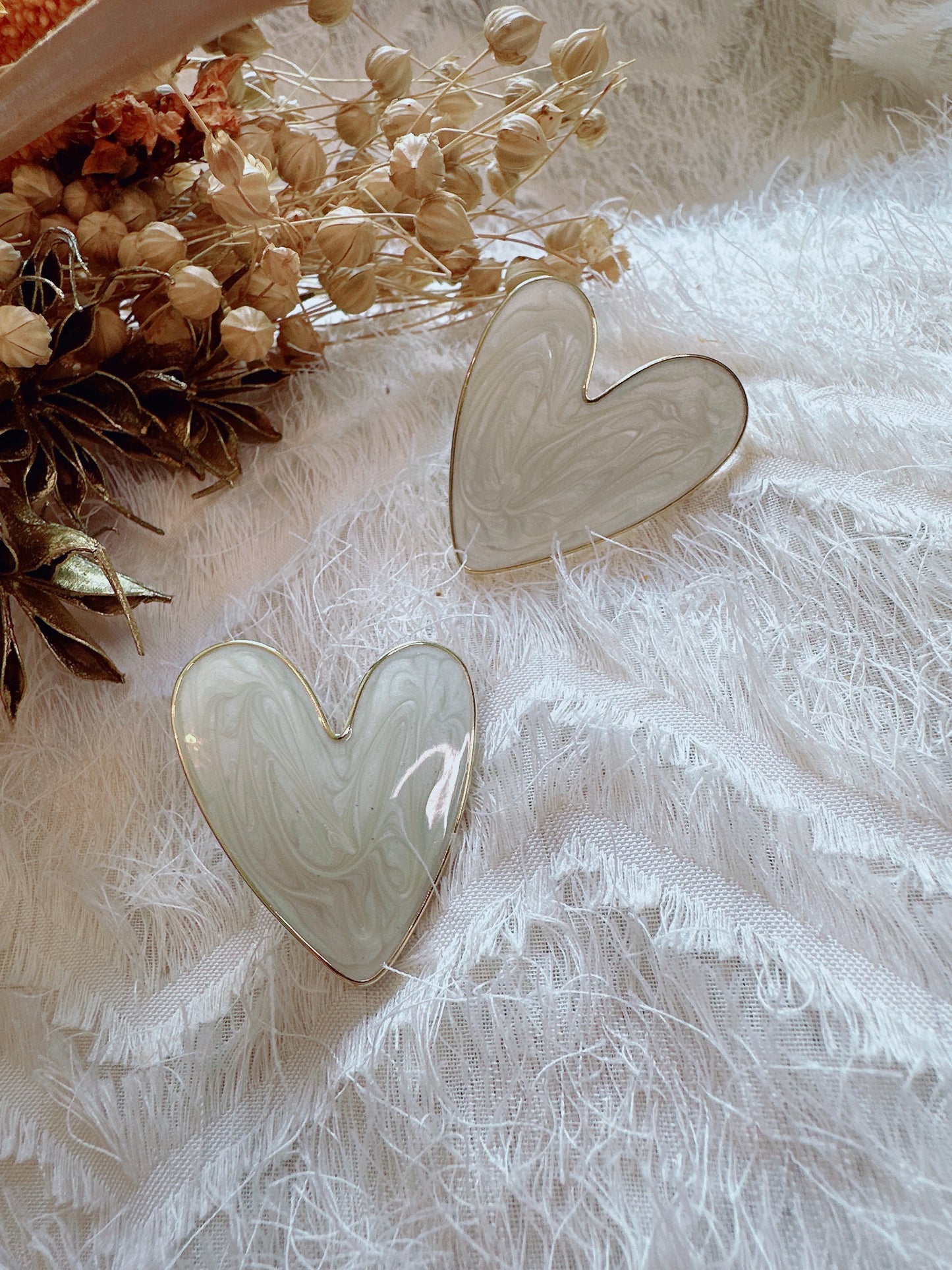 Heart shaped creamy color earrings Big